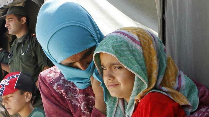Niña siria en un campo de refugiados