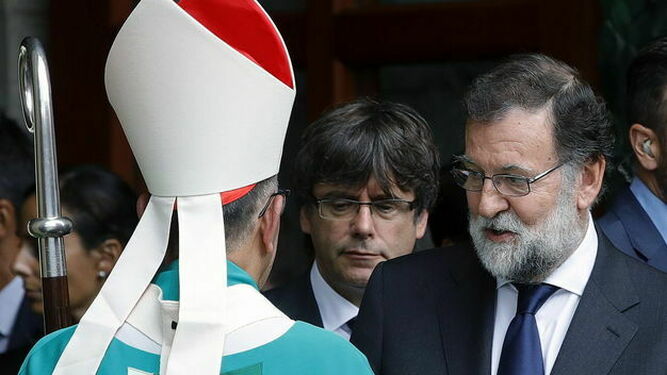 Omella, con Rajoy y Puigdemont