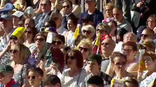 Fieles en la misa del Corpus