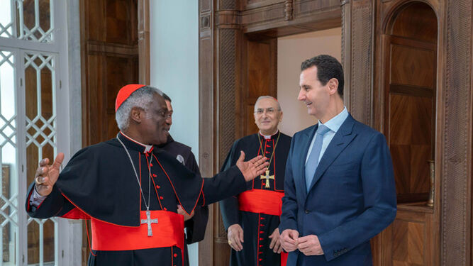 El cardenal Turkson y el presidente Assad
