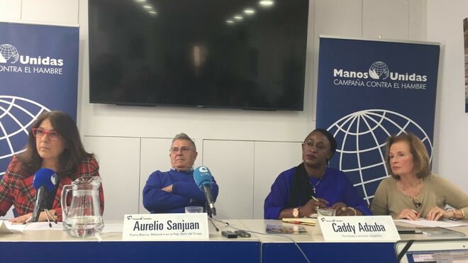 Aurelio Sanjuan y Caddy Adzuba en Manos Unidas