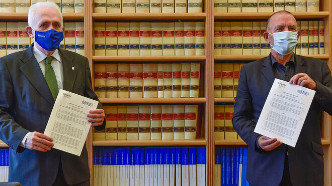 El rector José María Guibert y el responsable de la OIT Joaquín Nieto
