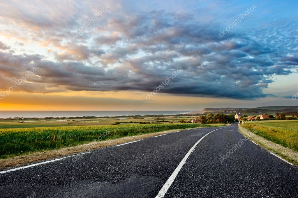 depositphotos_12727901-stock-photo-coastal-road-at-sunset