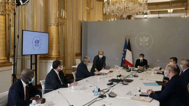 Firma de la Carta de Principios. Mohammed Moussaoui y Macron