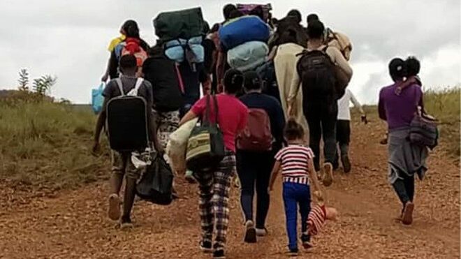 Migrantes en la frontera entre Colombia y Panamá.