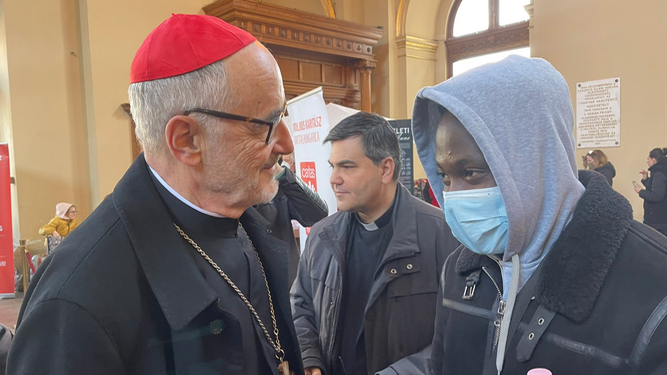 Czerny, con un refugiado en Budapest
