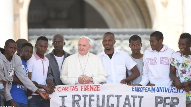 The Pope, with refugees