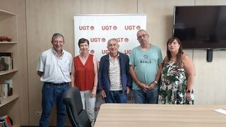 Los representantes de ambas organizaciones, durante el encuentro