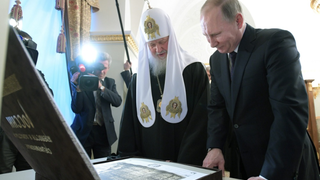 El patriarca ruso junto al presidente Putin