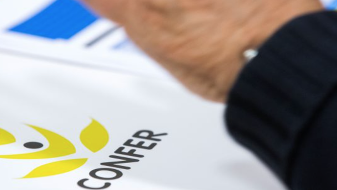 Confer