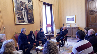 Los miembros del COF, en un encuentro con el arzobispo de Valencia