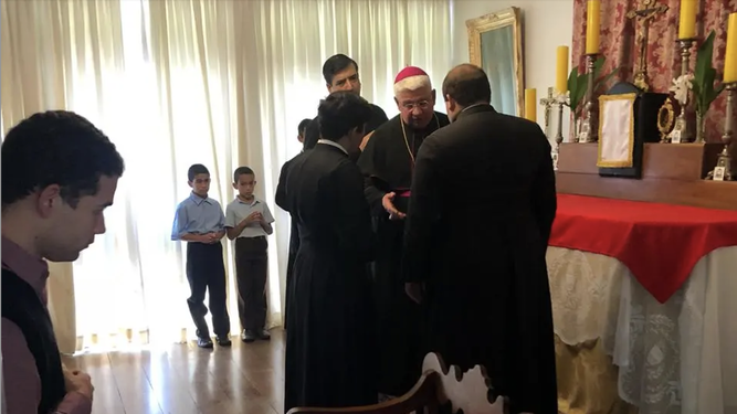 Da Silva con el obispo Dolan que le ordenó como obispo