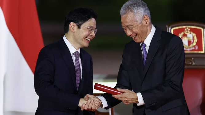 Lawrence Wong (izquierda) primer ministro de Singapur