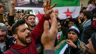 Sirios celebran la derrota de al-Assad