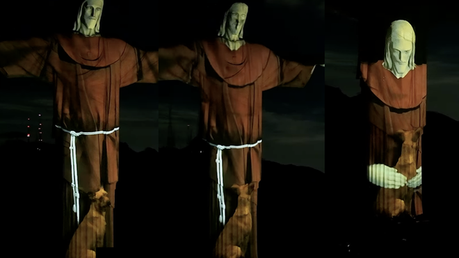 Cristo Redentor de Brasil abrazando a un  perro callejero