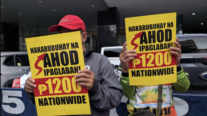 Trabajadores filipinos reclamando subidas salariales